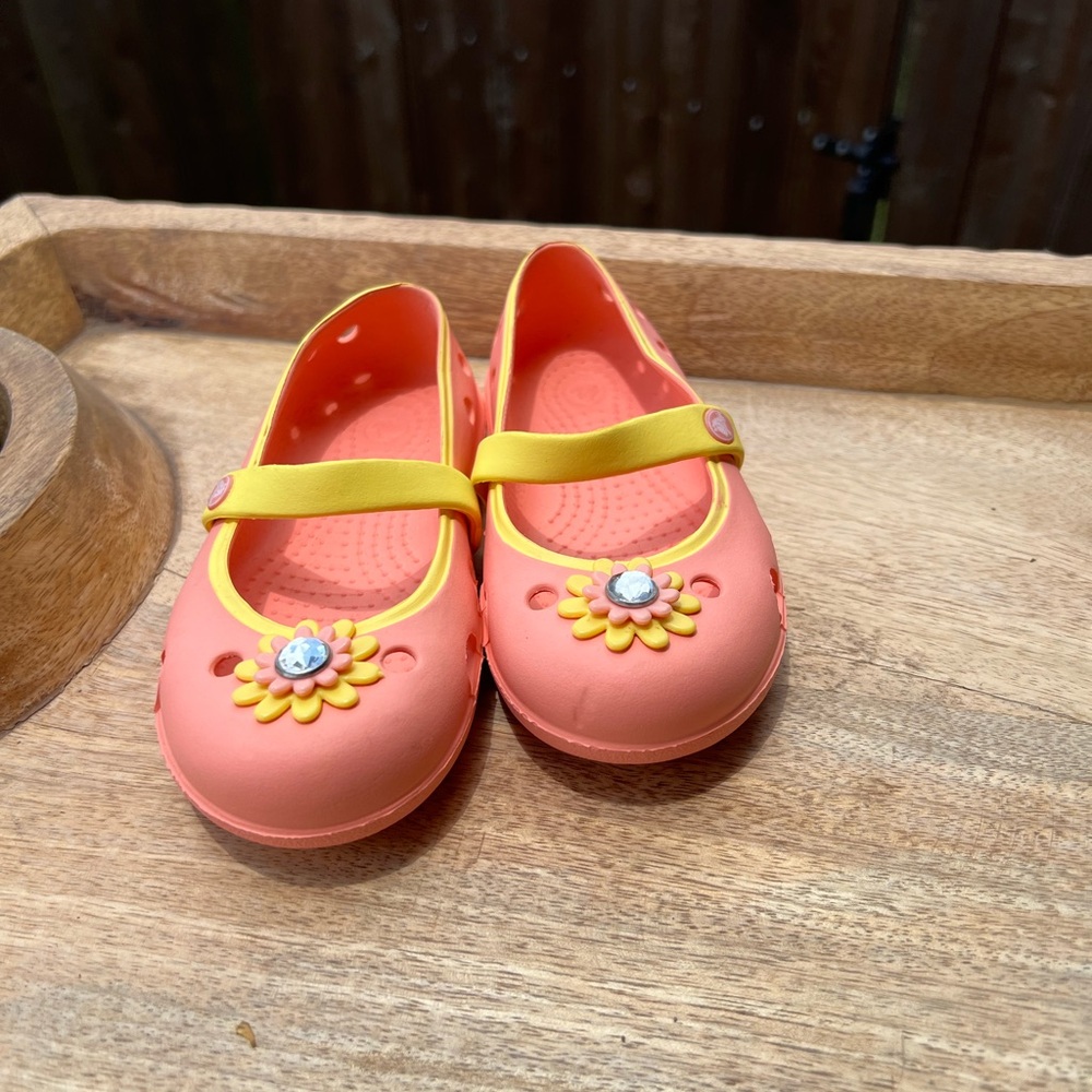CROCS Orange and Yellow Sandals with Floral Embellishment